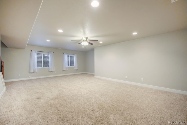 carpeted empty room with ceiling fan