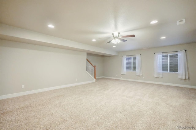 carpeted empty room with ceiling fan