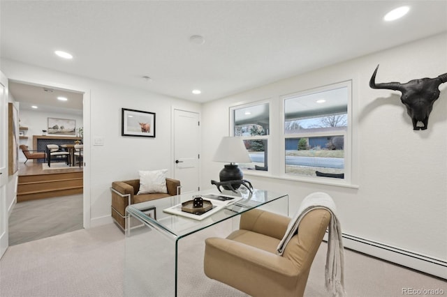 carpeted living room featuring a baseboard radiator and recessed lighting