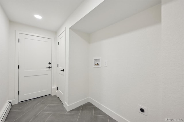 laundry room featuring hookup for a washing machine, a baseboard radiator, electric dryer hookup, dark tile patterned floors, and baseboards