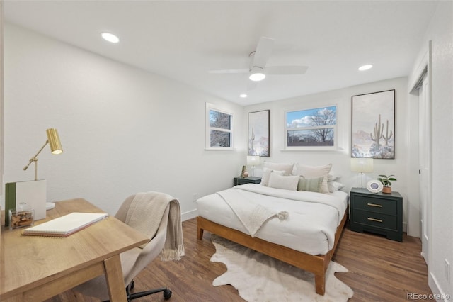 bedroom featuring baseboards, wood finished floors, a ceiling fan, and recessed lighting