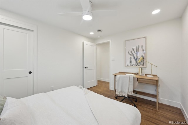 bedroom featuring recessed lighting, wood finished floors, visible vents, and baseboards