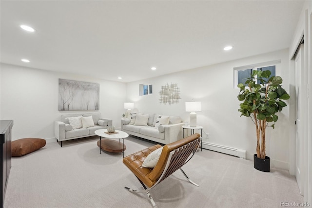 living area with carpet floors, baseboards, baseboard heating, and recessed lighting