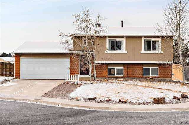 split level home with a garage