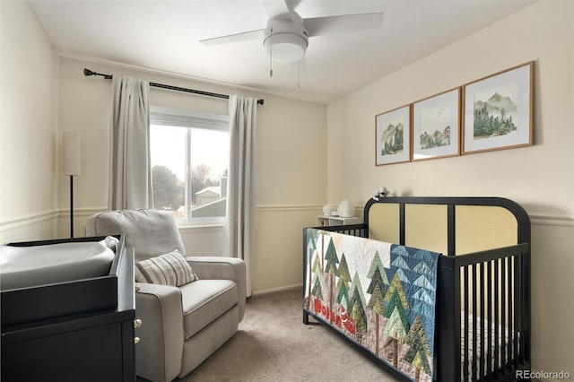 carpeted bedroom featuring ceiling fan