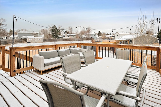 view of snow covered deck