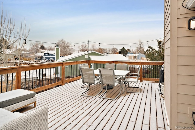 view of snow covered deck