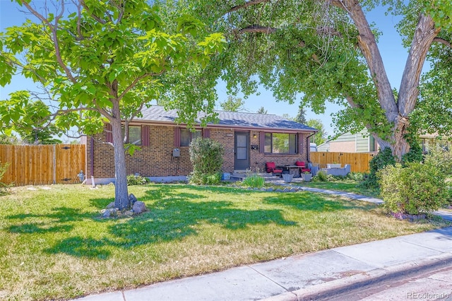 1166 W 98th Ave, Northglenn, CO 80260 - view of front facade with brick siding