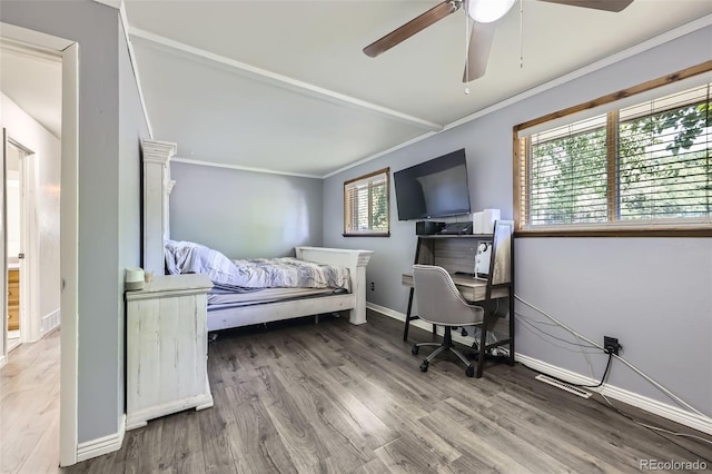 1166 W 98th Ave, Northglenn, CO 80260 - bedroom featuring wood finished floors, ornamental molding, ceiling fan, and lofted ceiling