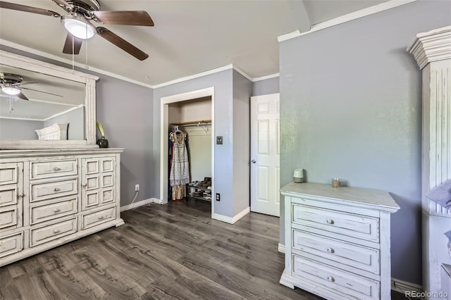 1166 W 98th Ave, Northglenn, CO 80260 - bedroom featuring dark wood-style floors, crown molding, a closet, and a ceiling fan