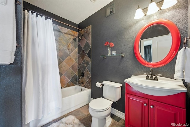 bathroom with a textured wall, toilet, shower / bath combo, vanity, and baseboards