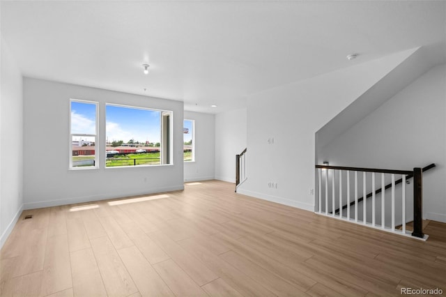 2740 W 68th Ave, Denver, CO 80221 - unfurnished living room with light wood finished floors