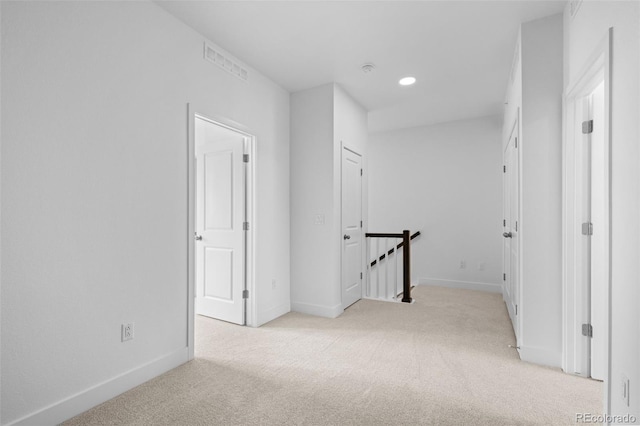 2740 W 68th Ave, Denver, CO 80221 - corridor with an upstairs landing, carpet floors, and recessed lighting