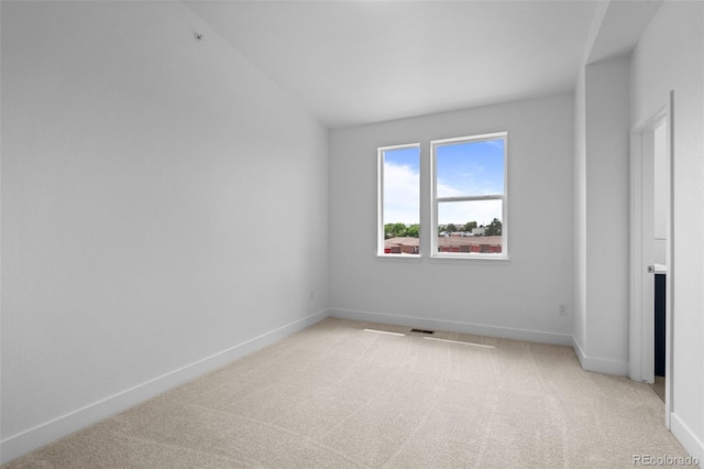 2740 W 68th Ave, Denver, CO 80221 - unfurnished bedroom with light carpet and lofted ceiling