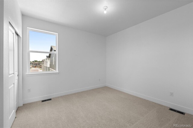 2740 W 68th Ave, Denver, CO 80221 - empty room with carpet flooring and baseboards