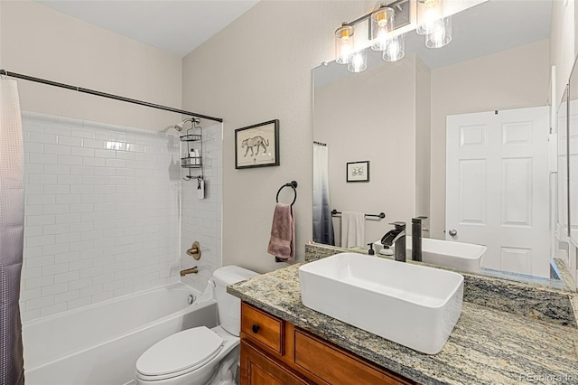 full bath with vanity, shower / bathtub combination with curtain, and toilet