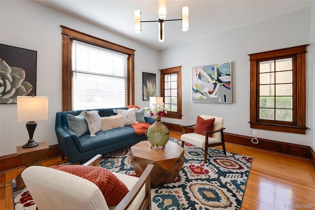 living room with wood finished floors and baseboards