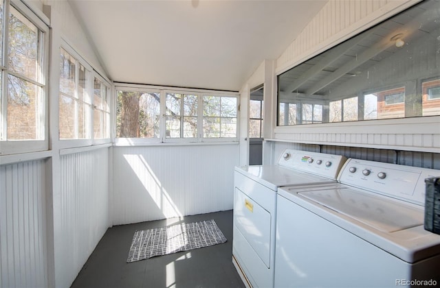 clothes washing area featuring washing machine and clothes dryer