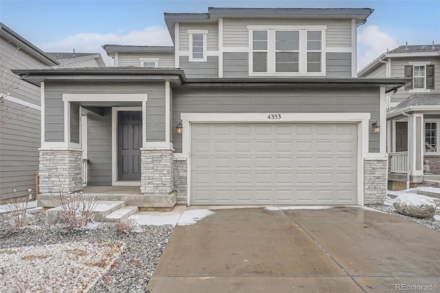 view of front of property with a garage