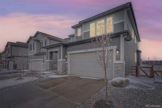 front facade with a garage