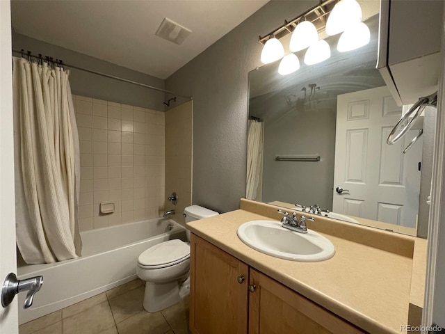 full bathroom with tile patterned floors, vanity, toilet, and shower / bath combo with shower curtain