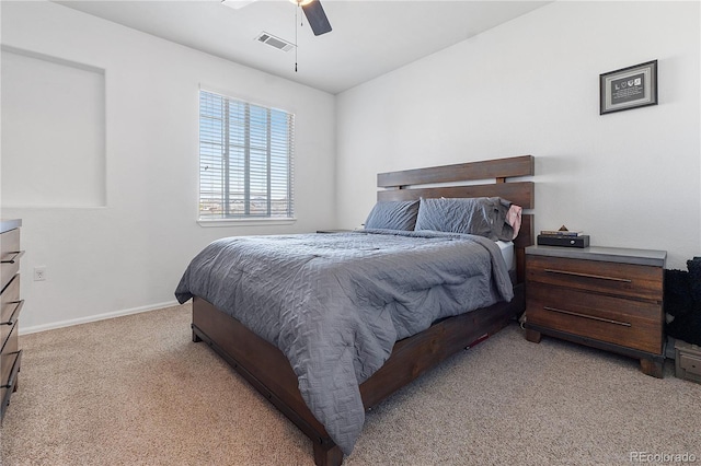 2682 S Cathay Way Unit 307, Aurora, CO 80013 - bedroom with light colored carpet, baseboards, and a ceiling fan