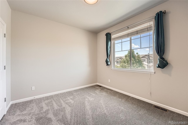 6612 S Muscadine Ct, Aurora, CO 80016 - carpeted empty room with baseboards
