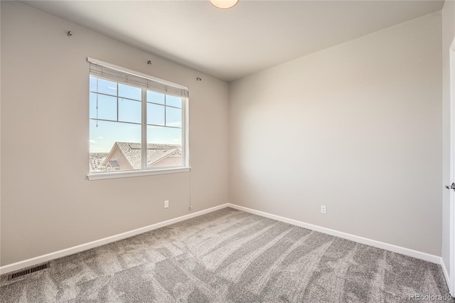 6612 S Muscadine Ct, Aurora, CO 80016 - carpeted spare room featuring baseboards