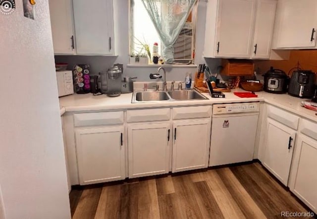 3190 S Joplin Ct, Aurora, CO 80013 - kitchen featuring white appliances, a sink, white cabinetry, and light countertops