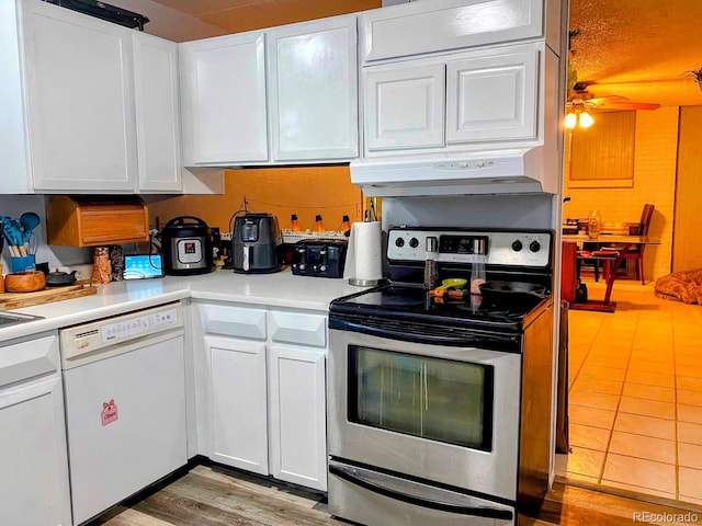 3190 S Joplin Ct, Aurora, CO 80013 - kitchen with dishwasher, electric range, under cabinet range hood, and white cabinets