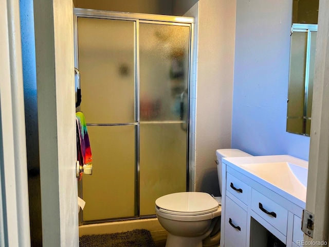 3190 S Joplin Ct, Aurora, CO 80013 - bathroom with a stall shower, toilet, and vanity