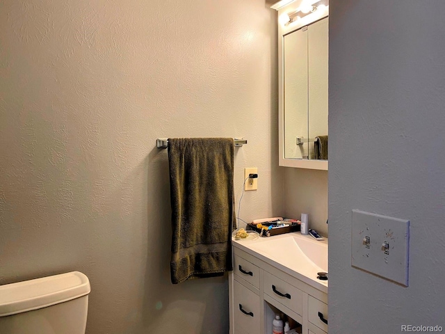 3190 S Joplin Ct, Aurora, CO 80013 - half bath featuring toilet and vanity