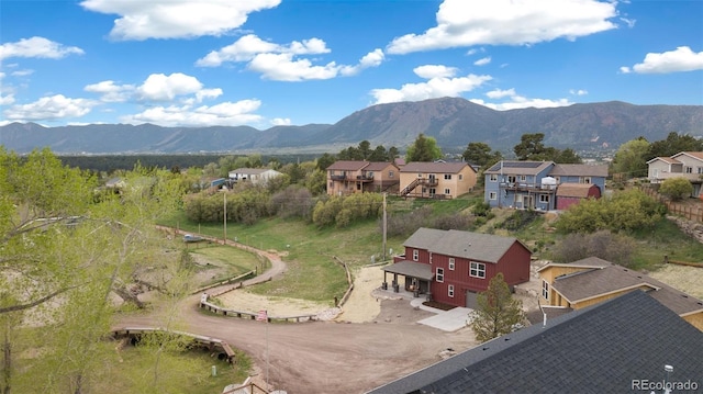 826 Meadow Ln, Palmer Lake, CO 80133 - view of mountain background featuring nearby suburban area