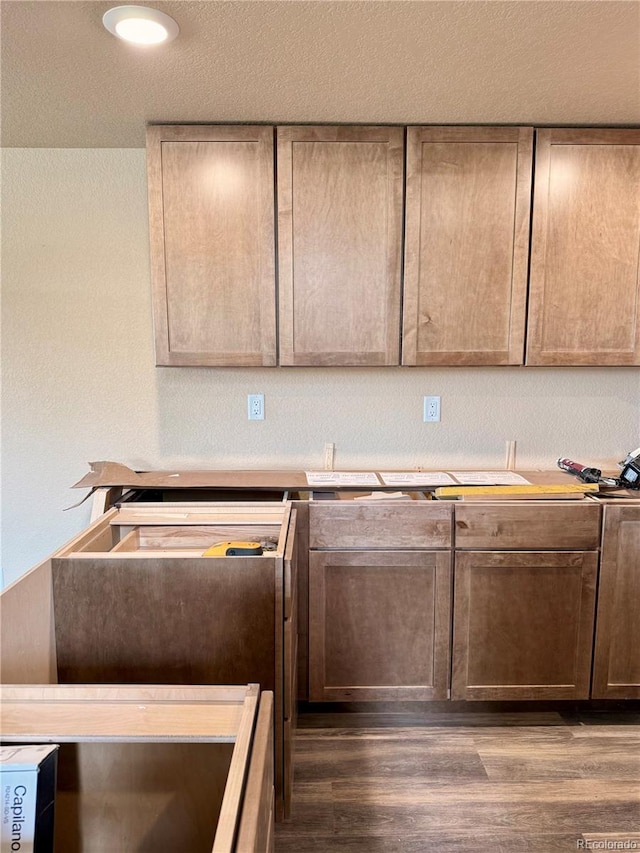 826 Meadow Ln, Palmer Lake, CO 80133 - kitchen featuring dark wood-type flooring and light countertops