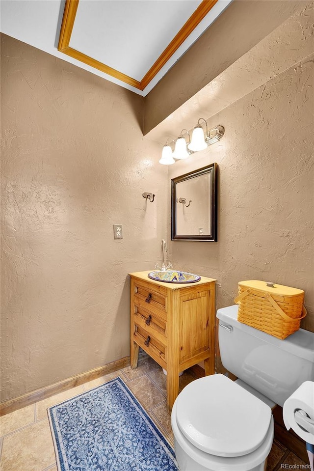 11149 Seton Pl, Westminster, CO 80031 - bathroom with vanity, a textured wall, crown molding, and tile patterned floors