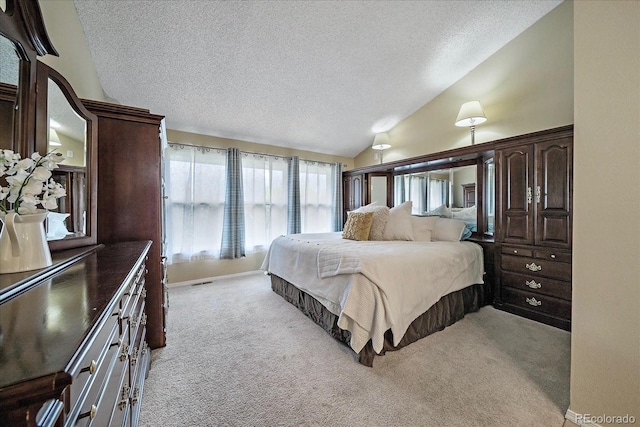 11149 Seton Pl, Westminster, CO 80031 - bedroom with light colored carpet, a textured ceiling, and lofted ceiling