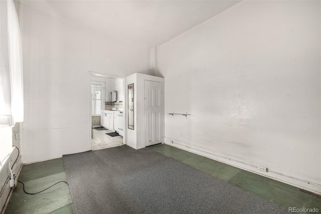 3907 Inca St Unit 3905, Denver, CO 80211 - spare room with dark colored carpet