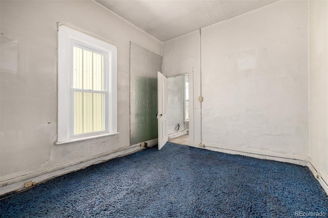 3907 Inca St Unit 3905, Denver, CO 80211 - empty room with healthy amount of natural light and carpet floors
