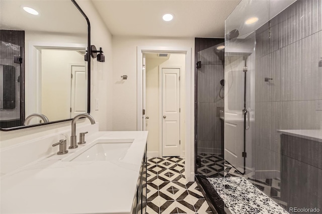 8982 Spaulding St, Parker, CO 80134 - full bathroom featuring vanity, a stall shower, and recessed lighting
