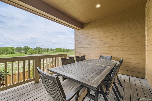 8982 Spaulding St, Parker, CO 80134 - wooden terrace featuring outdoor dining area