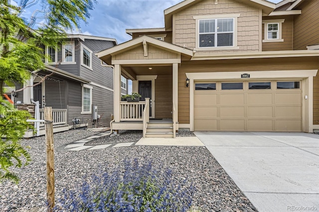 8982 Spaulding St, Parker, CO 80134 - view of front facade with an attached garage, concrete driveway, and covered porch