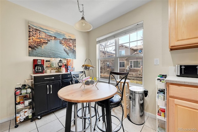 dining room with light tile patterned floors