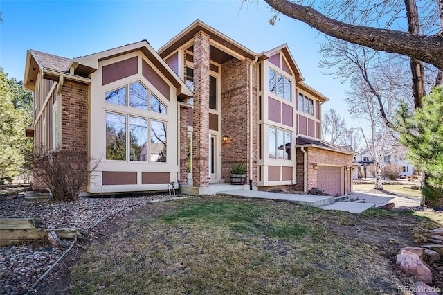 view of front of property with brick siding and stucco siding