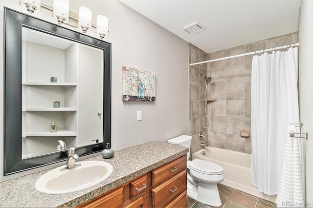 bathroom featuring toilet, vanity, and shower / bath combo