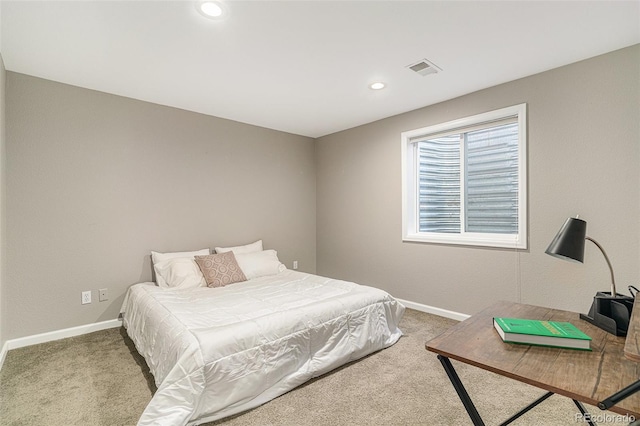 carpeted bedroom with recessed lighting, visible vents, and baseboards