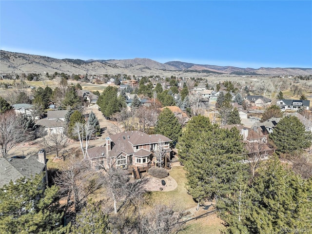 drone / aerial view featuring a mountain view and a residential view