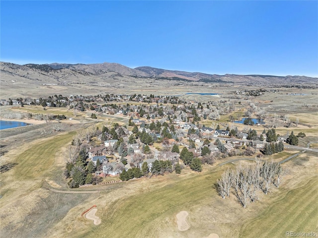 aerial view with a water and mountain view