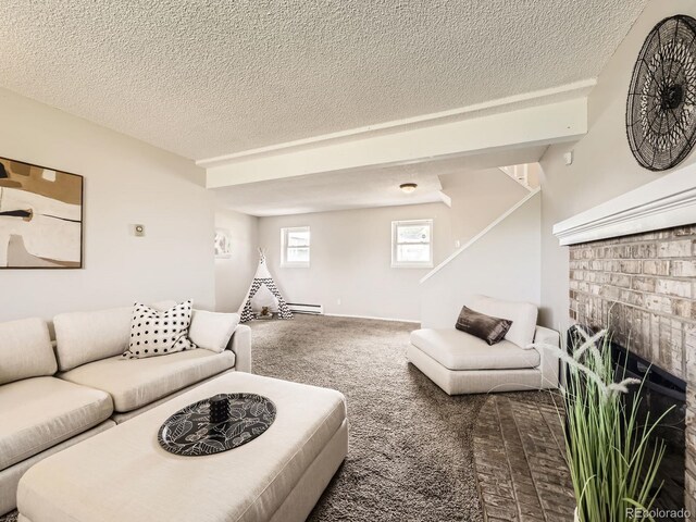 11062 Hudson Ct, Thornton, CO 80233 - carpeted living room featuring a textured ceiling, a fireplace, and a baseboard radiator