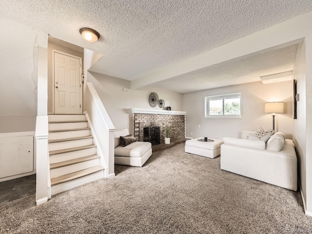 11062 Hudson Ct, Thornton, CO 80233 - carpeted living area featuring stairs, a fireplace, and a textured ceiling
