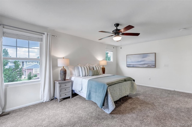 2430 S Jebel Way, Aurora, CO 80013 - bedroom with light colored carpet and ceiling fan